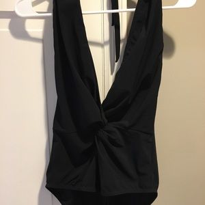 Brand new with tags! Black plunging neck one piece